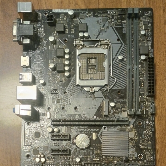ASUS Black Internal Motherboard with CPU Socket and RAM Slots